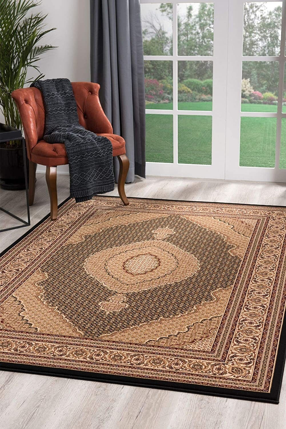 7' X 9' Beige and Black Medallion Power Loom Area Rug