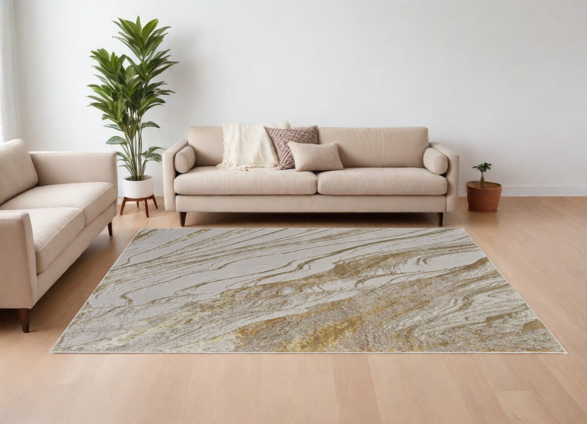 10' X 13' Ivory Brown and Gold Abstract Power Loom Area Rug